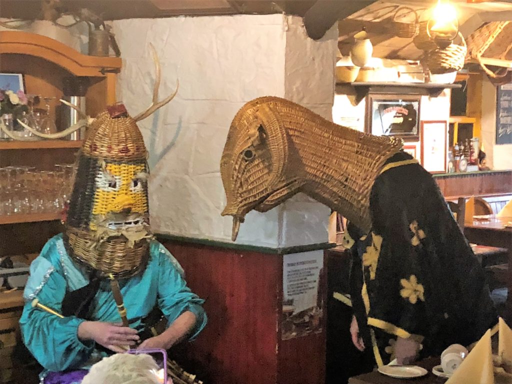 Irish mummers in traditional costumes. 